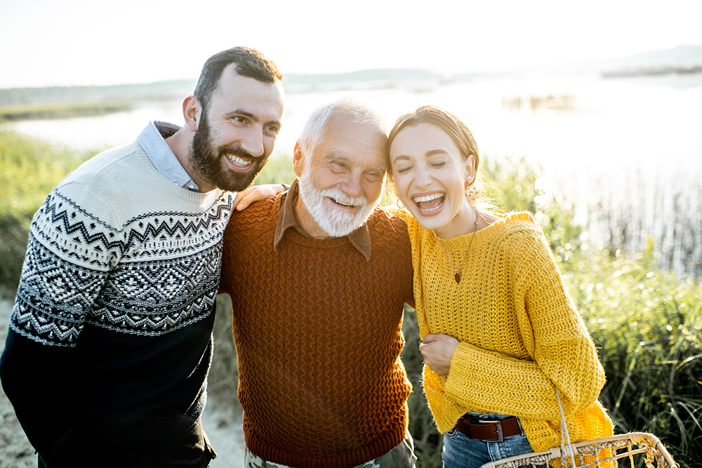 Three generations of the same family laughing together